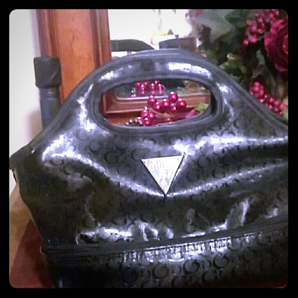 Guess Purses with underneath hidden compartment